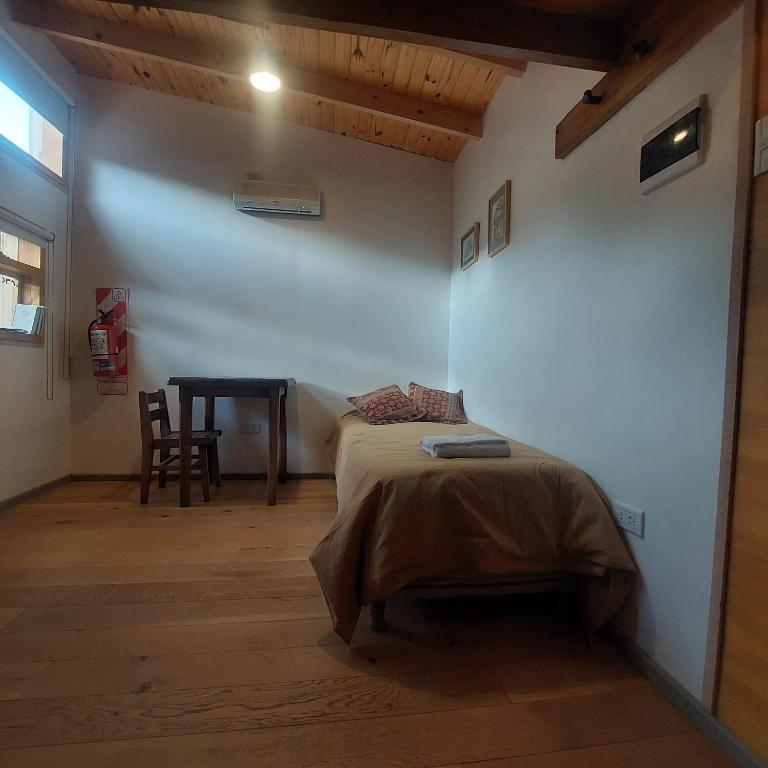 Postel nebo postele na pokoji v ubytování Klettern Tiny House - Lo de Juan