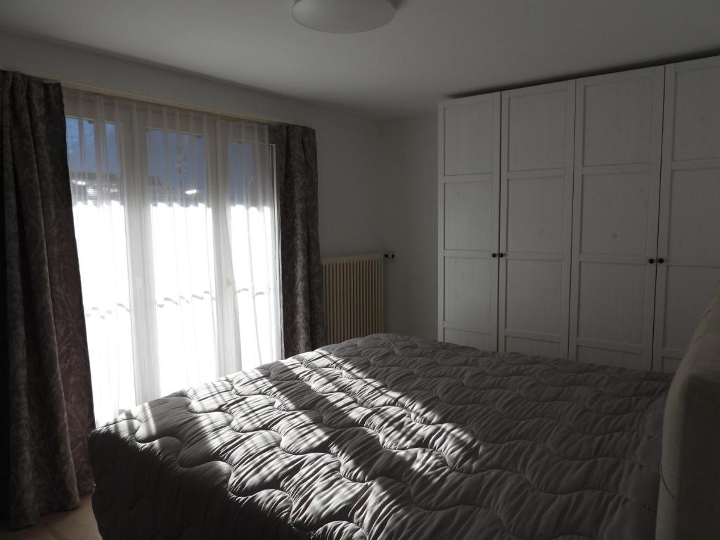 Postel nebo postele na pokoji v ubytování Casa-Casa Linthal