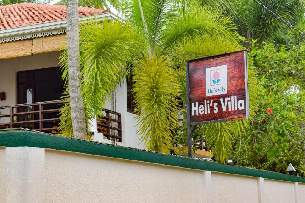 Certifikát, hodnocení, plakát nebo jiný dokument vystavený v ubytování Heli's Villa Unawatuna