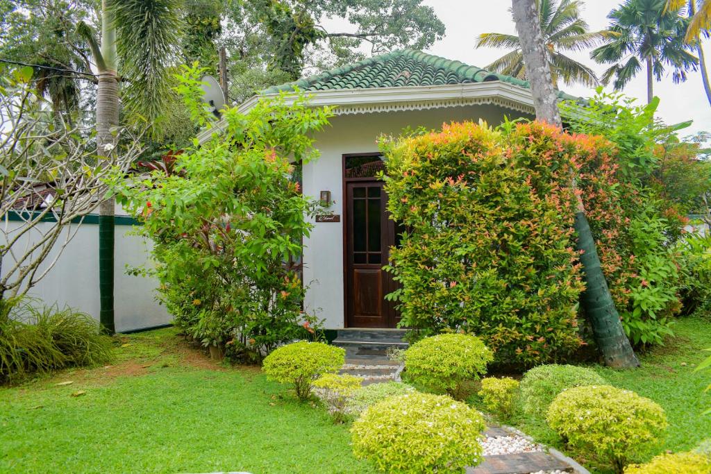 Zahrada ubytování Heli's Villa Unawatuna