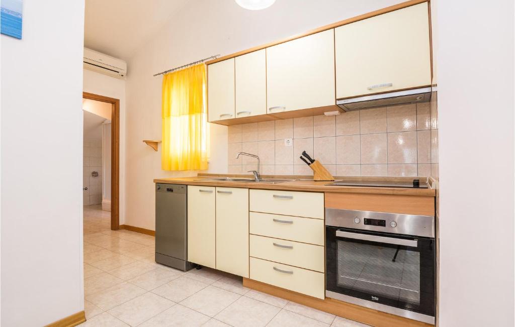 Kuchyň nebo kuchyňský kout v ubytování Apartment 7,Ulica Br, Ii