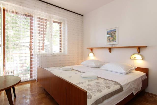 Posteľ alebo postele v izbe v ubytovaní Eco-Apartments with nice garden