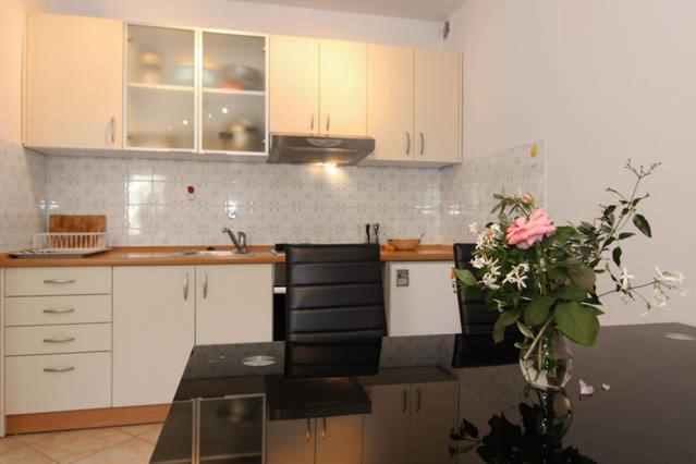 Kuchyňa alebo kuchynka v ubytovaní Eco-Apartments with nice garden