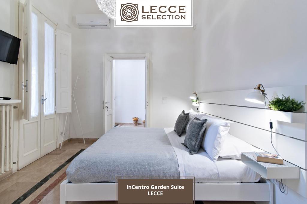 Postel nebo postele na pokoji v ubytování InCentro Comfort Suite - Lecce Selection