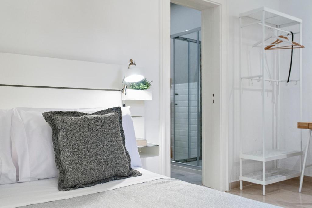 Postel nebo postele na pokoji v ubytování InCentro Comfort Suite - Lecce Selection