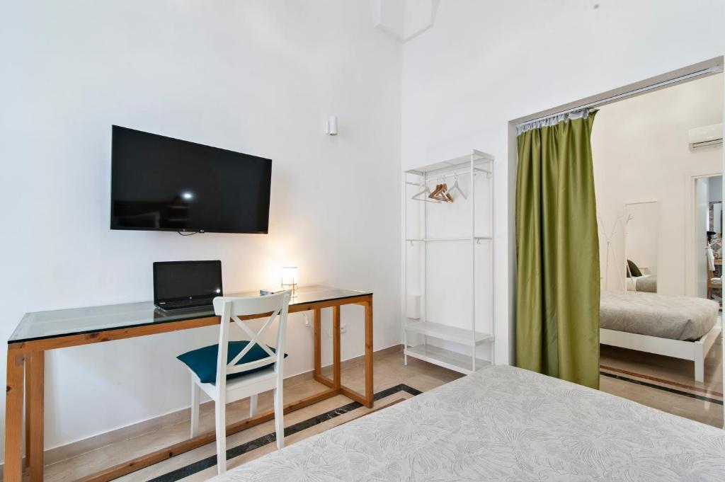 TV a/nebo společenská místnost v ubytování InCentro Comfort Suite - Lecce Selection