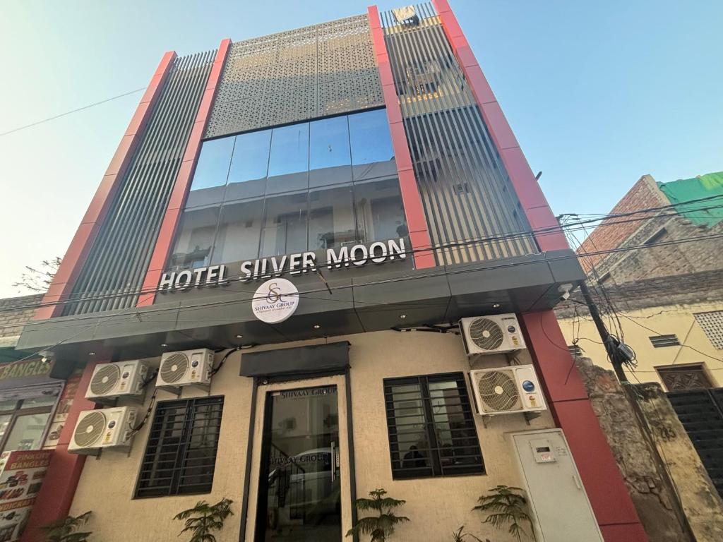 a hotel silvermoon building with a sign on it at Hotel Silver Moon-200 meter Jaipur Junction in Jaipur