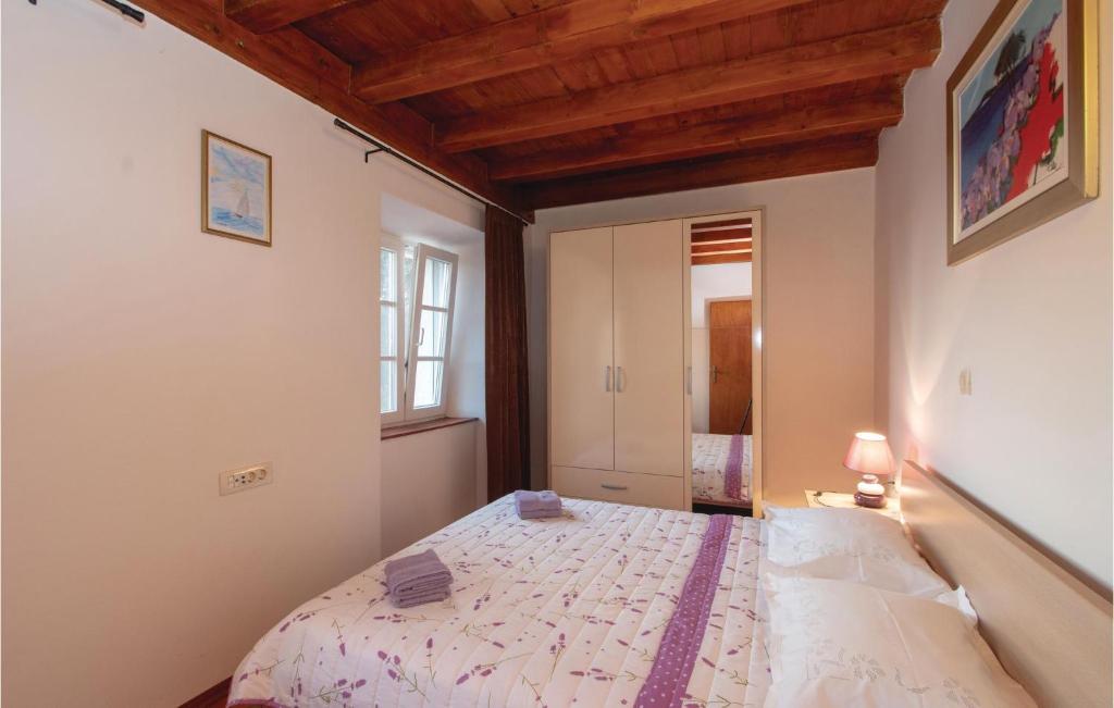 Posteľ alebo postele v izbe v ubytovaní Two-Bedroom Holiday Home In Orebic