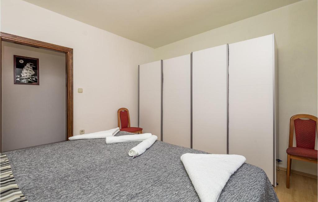 Posteľ alebo postele v izbe v ubytovaní Stunning Apartment In Rijeka
