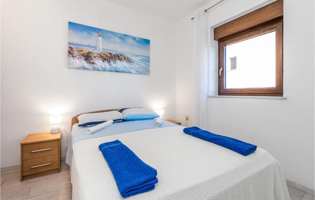 Posteľ alebo postele v izbe v ubytovaní Stunning Apartment In Rijeka