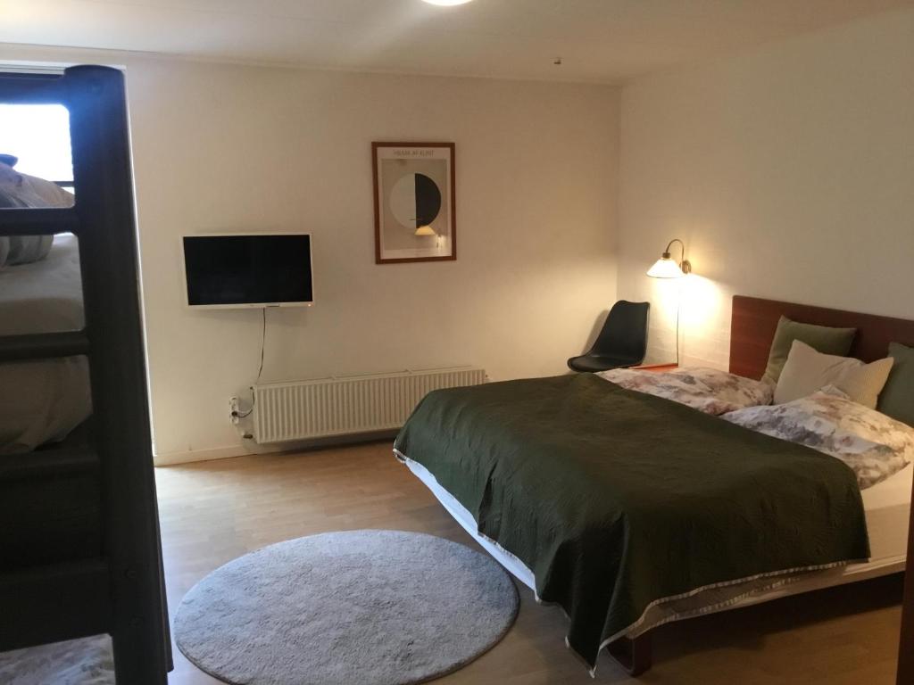Postel nebo postele na pokoji v ubytování Børglum Mejeri Hotel