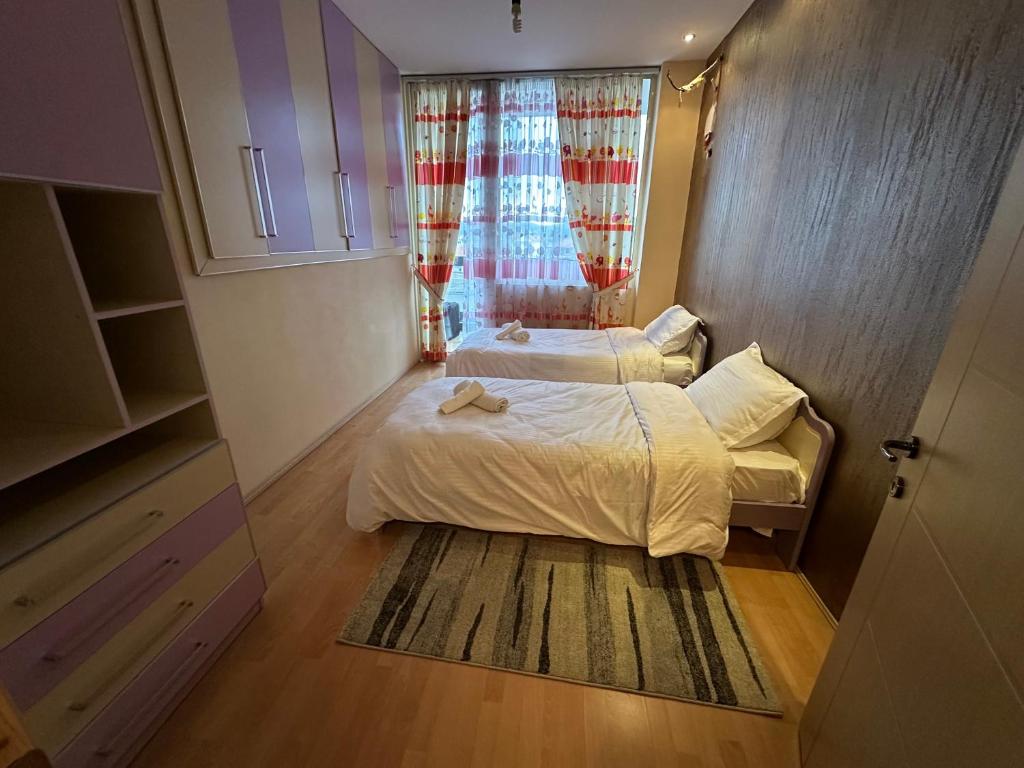 Postel nebo postele na pokoji v ubytování Apartment Liqeni