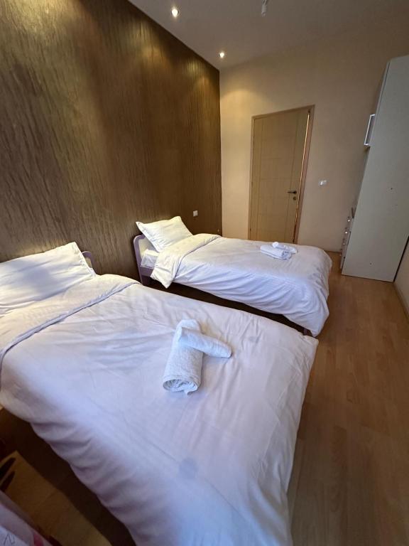 Postel nebo postele na pokoji v ubytování Apartment Liqeni