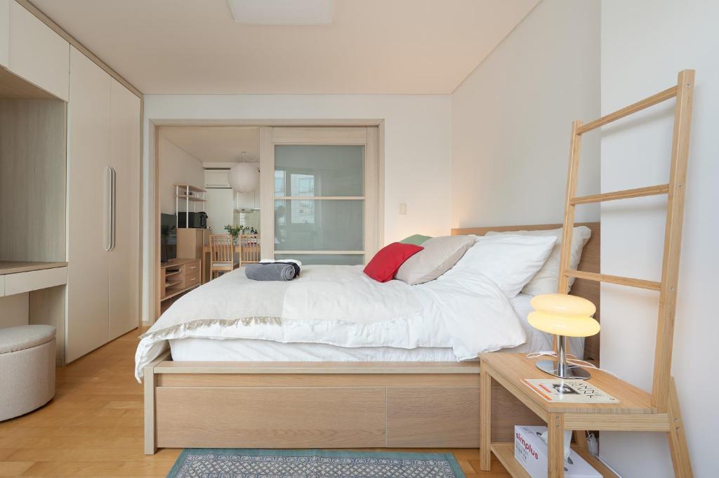 Postel nebo postele na pokoji v ubytování Urban Studio