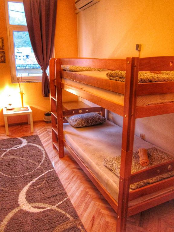 Postel nebo postele na pokoji v ubytování Hostel Taso's House