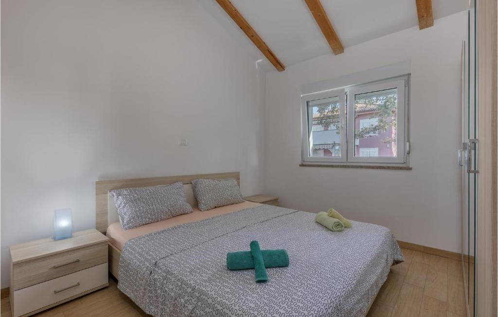 Posteľ alebo postele v izbe v ubytovaní 2 Bedroom Amazing Apartment In Njivice