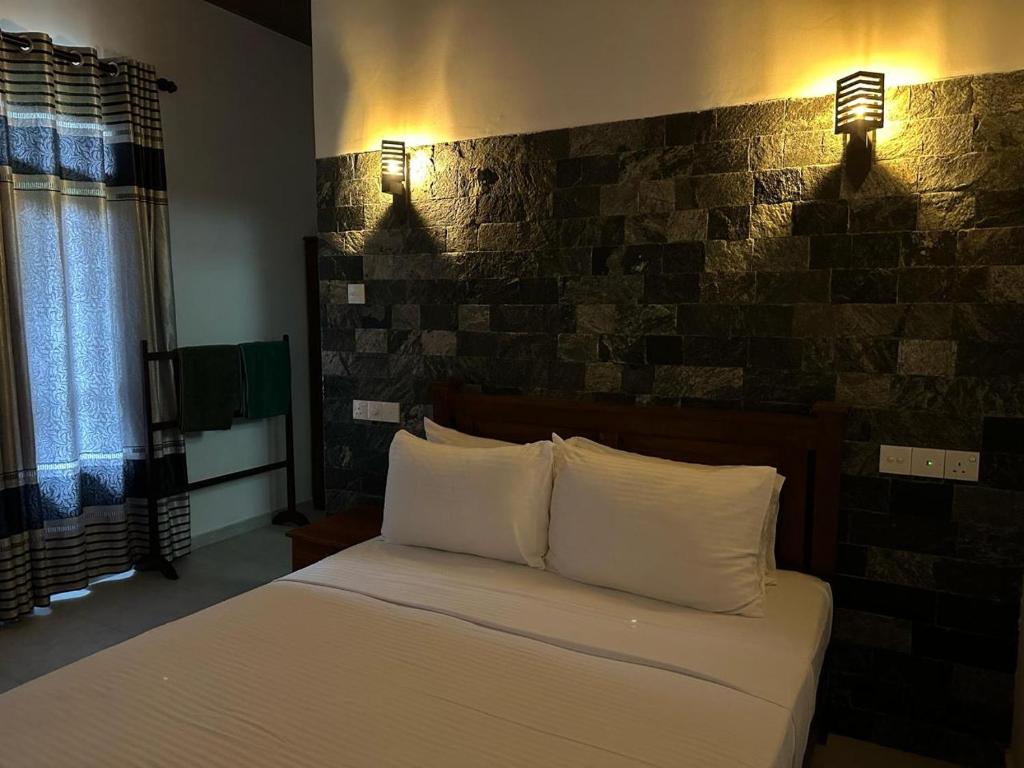 Letto o letti in una camera di Shine Wave Turtle Beach