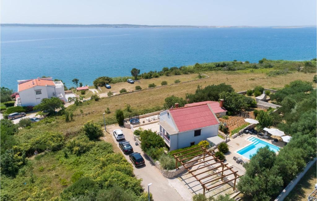 an aerial view of a house with a swimming pool at Holiday Home Rtina 24 in Rtina