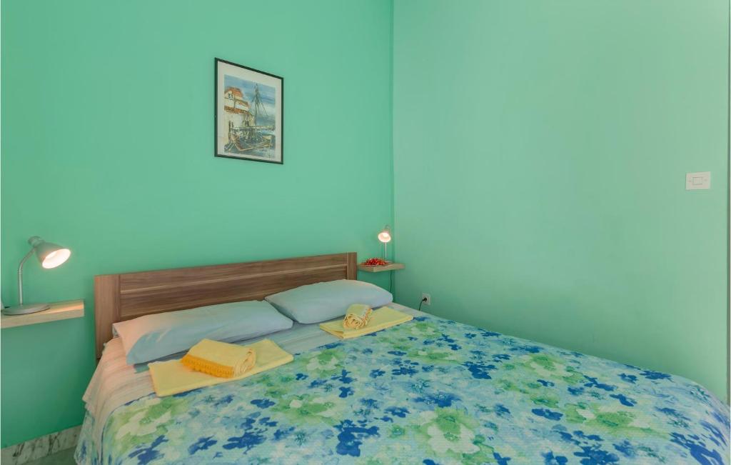 Postel nebo postele na pokoji v ubytování Apartment Barbariga M-500