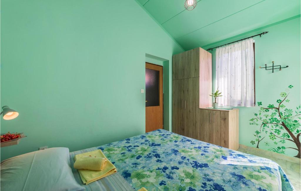 Postel nebo postele na pokoji v ubytování Apartment Barbariga M-500
