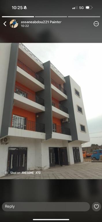 a screenshot of a building with a picture of it at Apartment building in Salagi in Sukuta