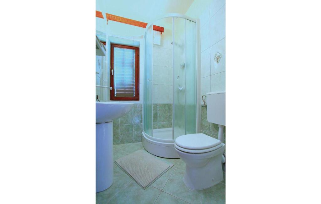 Kúpeľňa v ubytovaní Apartment Prizba Iii