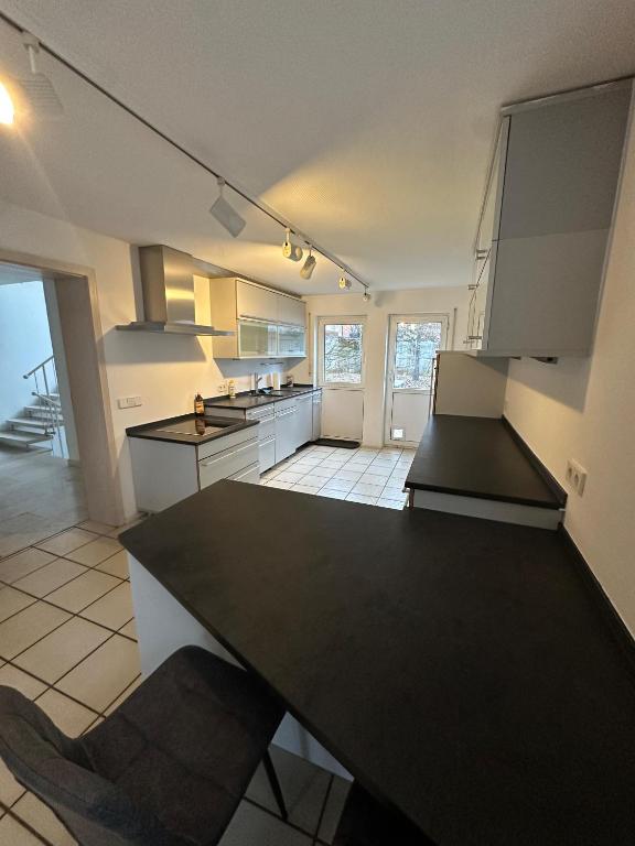 Kuchyň nebo kuchyňský kout v ubytování Diti Apartment Singen