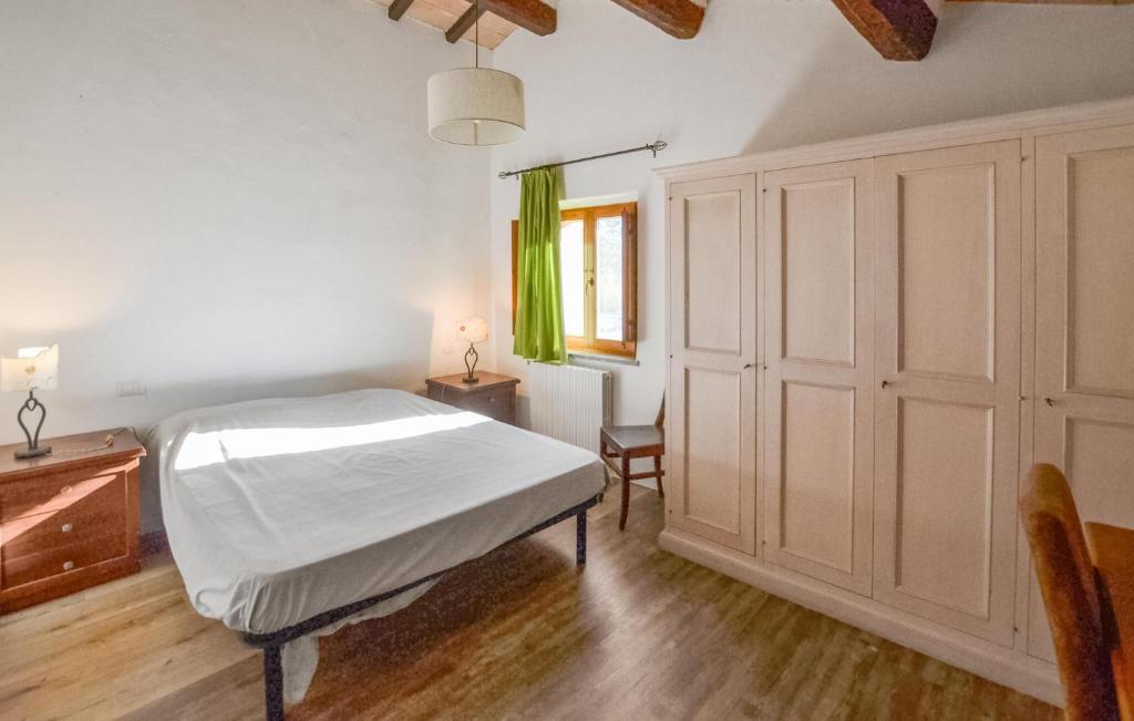 A bed or beds in a room at Awesome Home In Città Di Castello