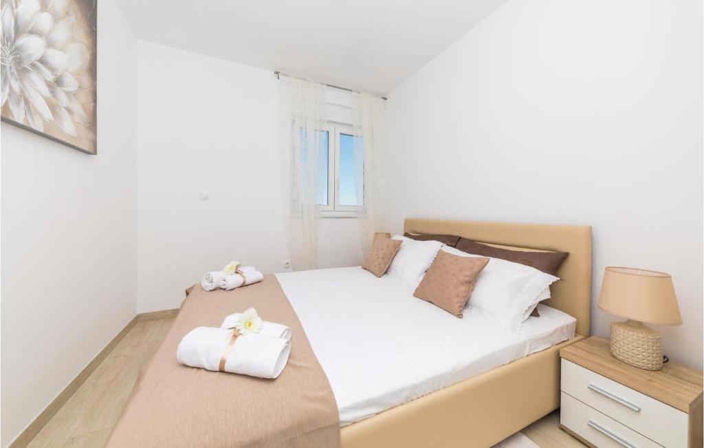 Posteľ alebo postele v izbe v ubytovaní Two-Bedroom Apartment In Trogir