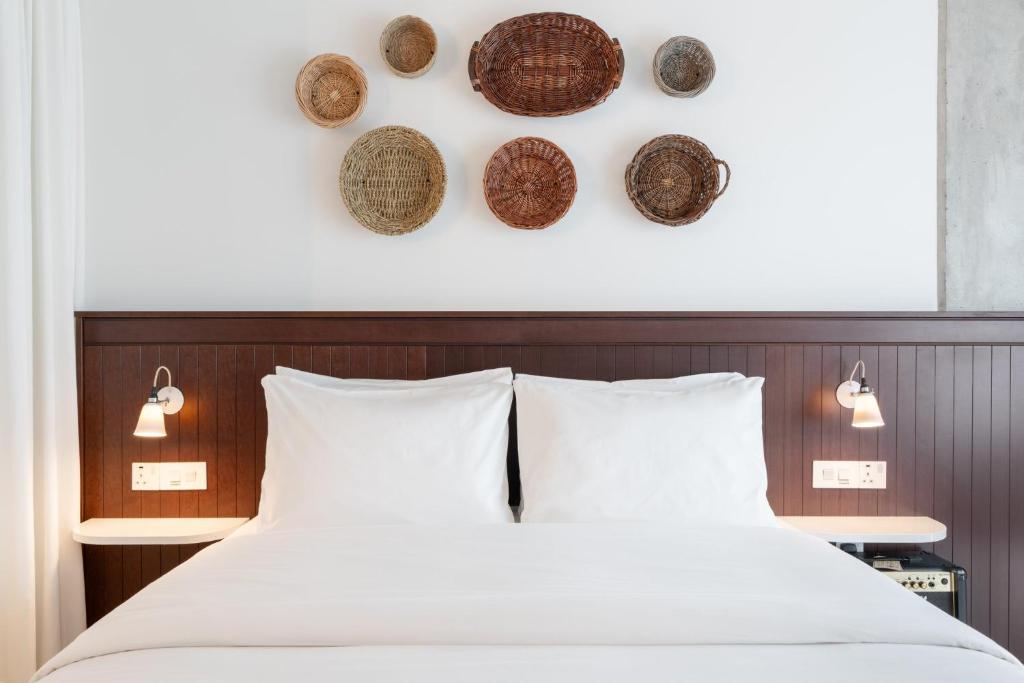 Rúm í herbergi á Ruby Molly Hotel Dublin