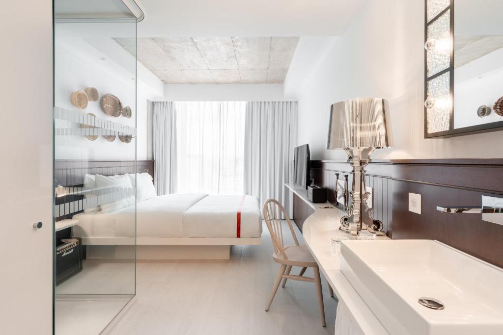 Rúm í herbergi á Ruby Molly Hotel Dublin