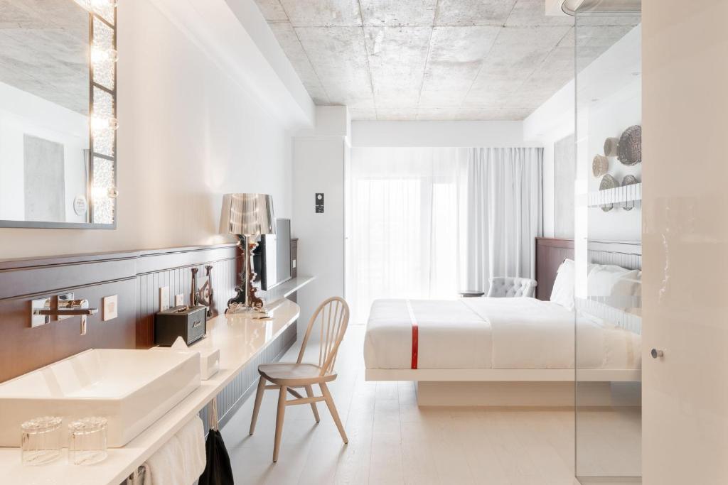 Rúm í herbergi á Ruby Molly Hotel Dublin
