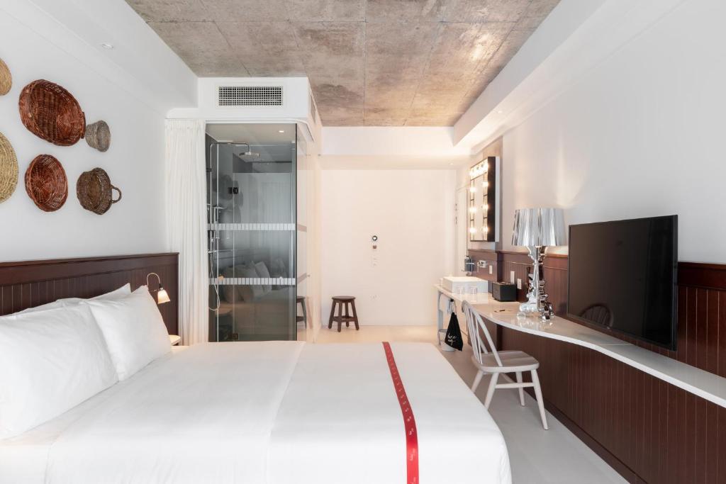 Rúm í herbergi á Ruby Molly Hotel Dublin