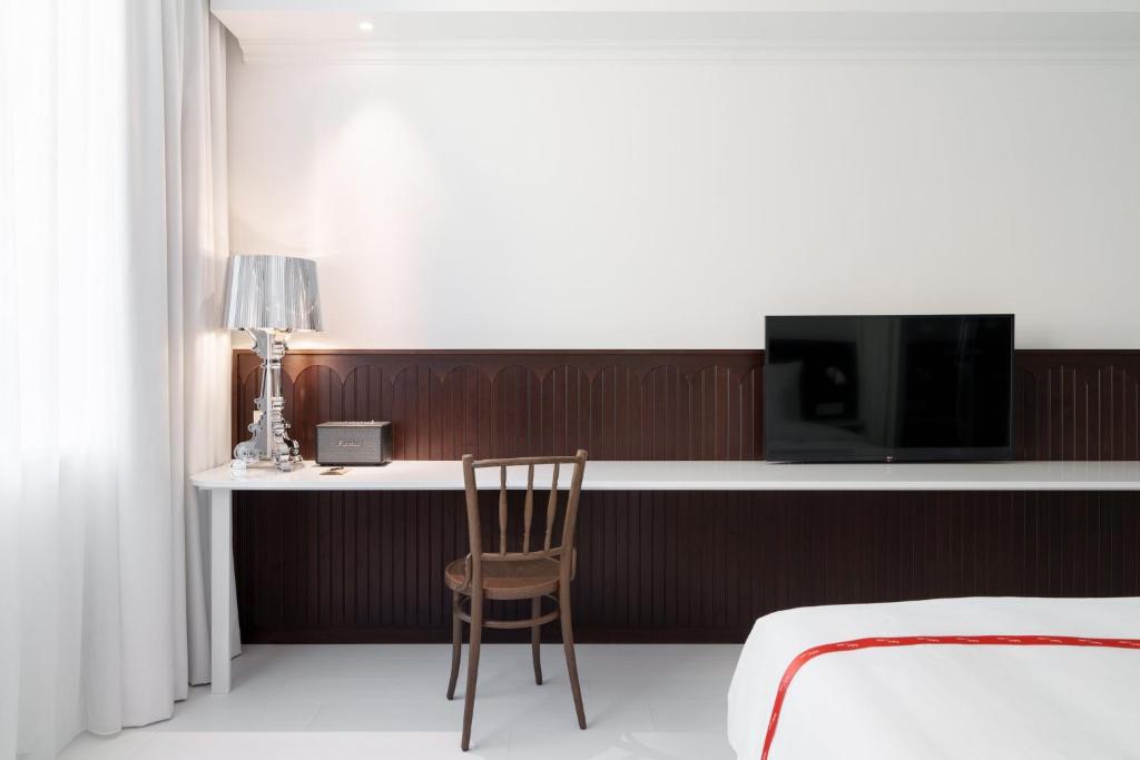 Rúm í herbergi á Ruby Hanna Hotel Stuttgart