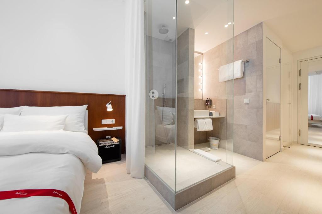 Postel nebo postele na pokoji v ubytování Ruby Marie Hotel Vienna