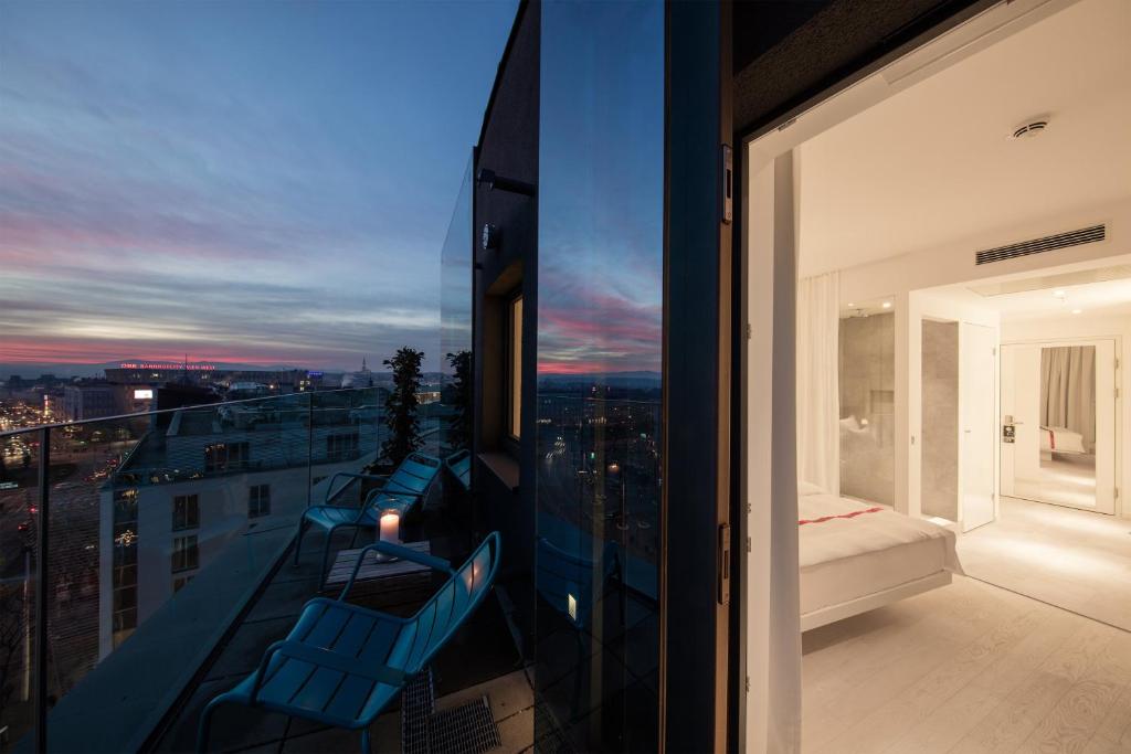 Postel nebo postele na pokoji v ubytování Ruby Marie Hotel Vienna