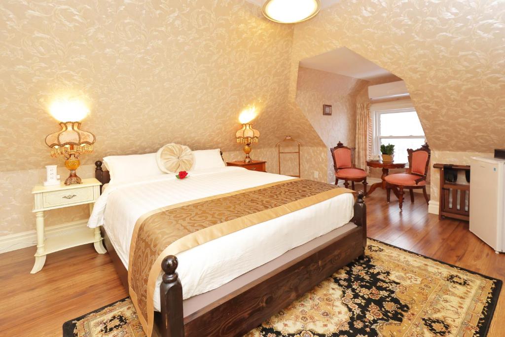 Voodi või voodid majutusasutuse Prince inn toas