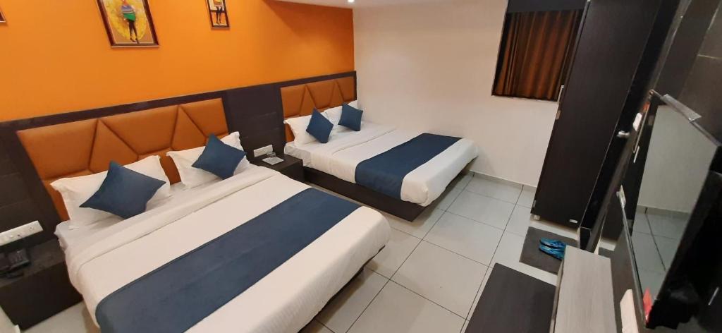 Postel nebo postele na pokoji v ubytování Hotel Sunview