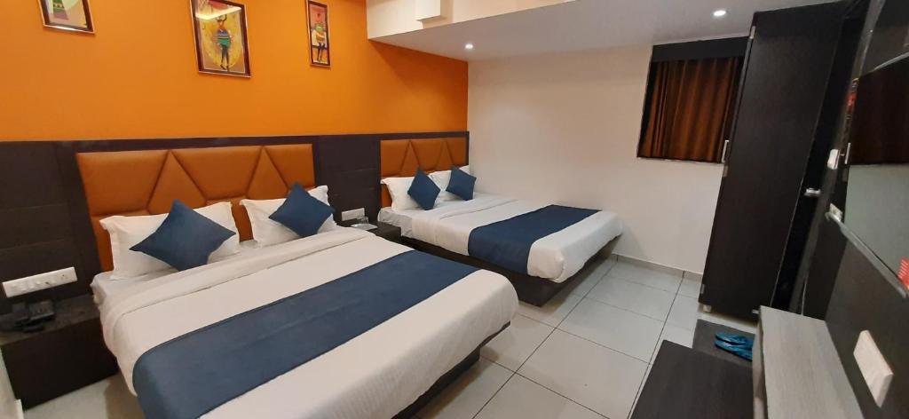 Postel nebo postele na pokoji v ubytování Hotel Sunview
