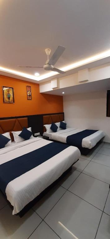 Postel nebo postele na pokoji v ubytování Hotel Sunview
