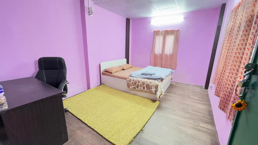 Postel nebo postele na pokoji v ubytování Maa Buu Chhen
