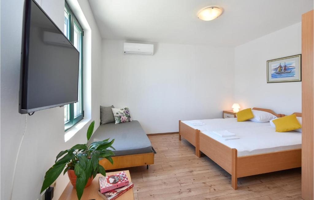 Posteľ alebo postele v izbe v ubytovaní Two-Bedroom Holiday Home In Zastrazisce