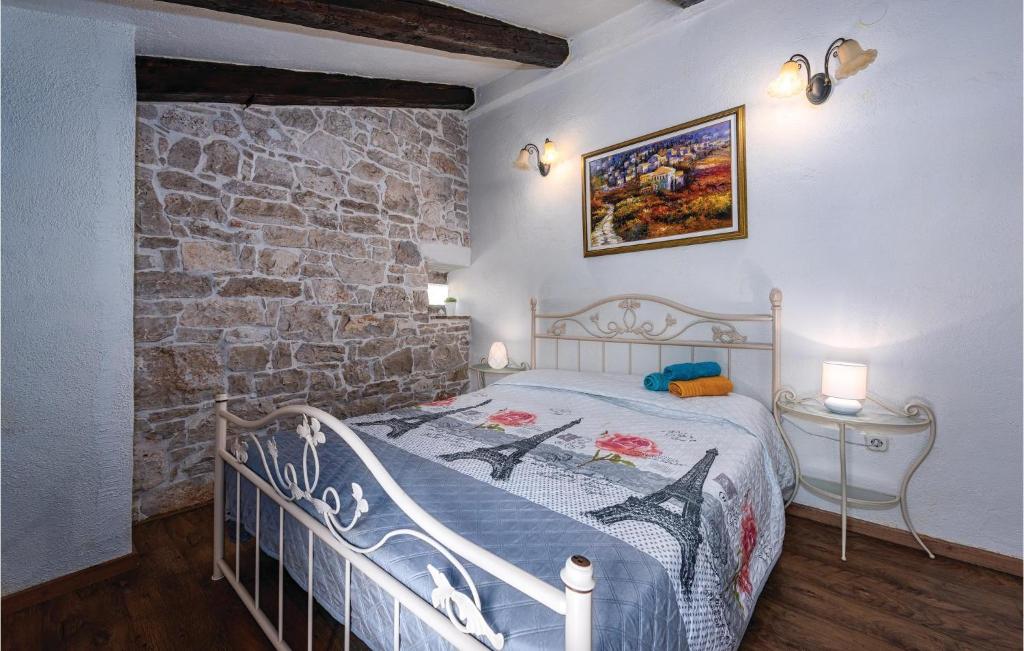 Postel nebo postele na pokoji v ubytování Holiday Home Gedici Iii