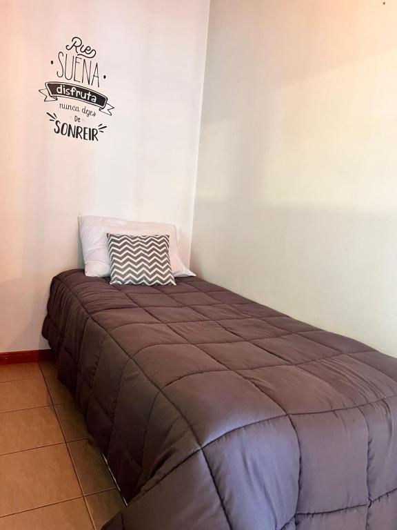 Postel nebo postele na pokoji v ubytování Departamentos Calafate Host Espora