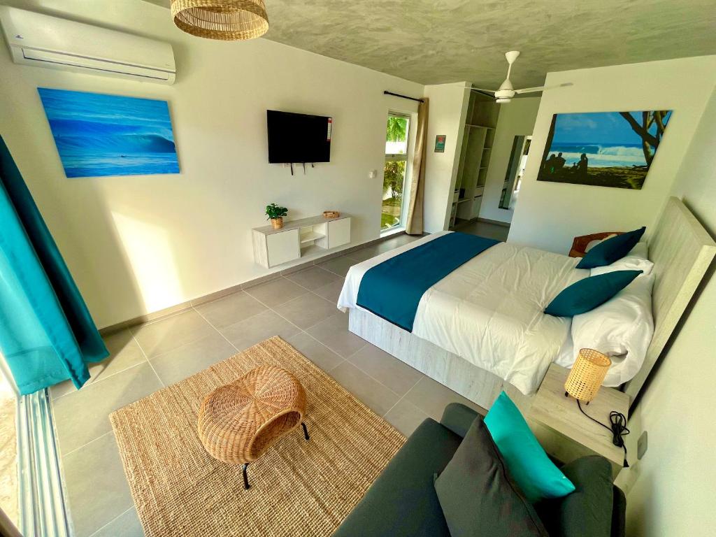 Postel nebo postele na pokoji v ubytování La Curadiña - Encuentro Surf Resort