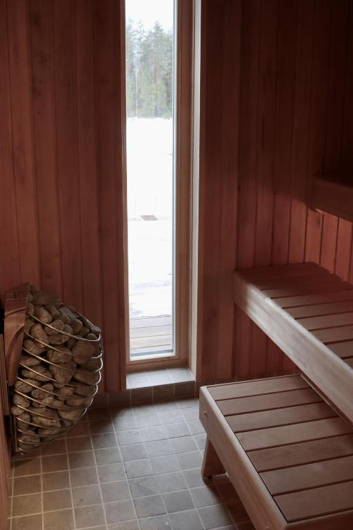 Postel nebo postele na pokoji v ubytování Metsajärve puhkemaja