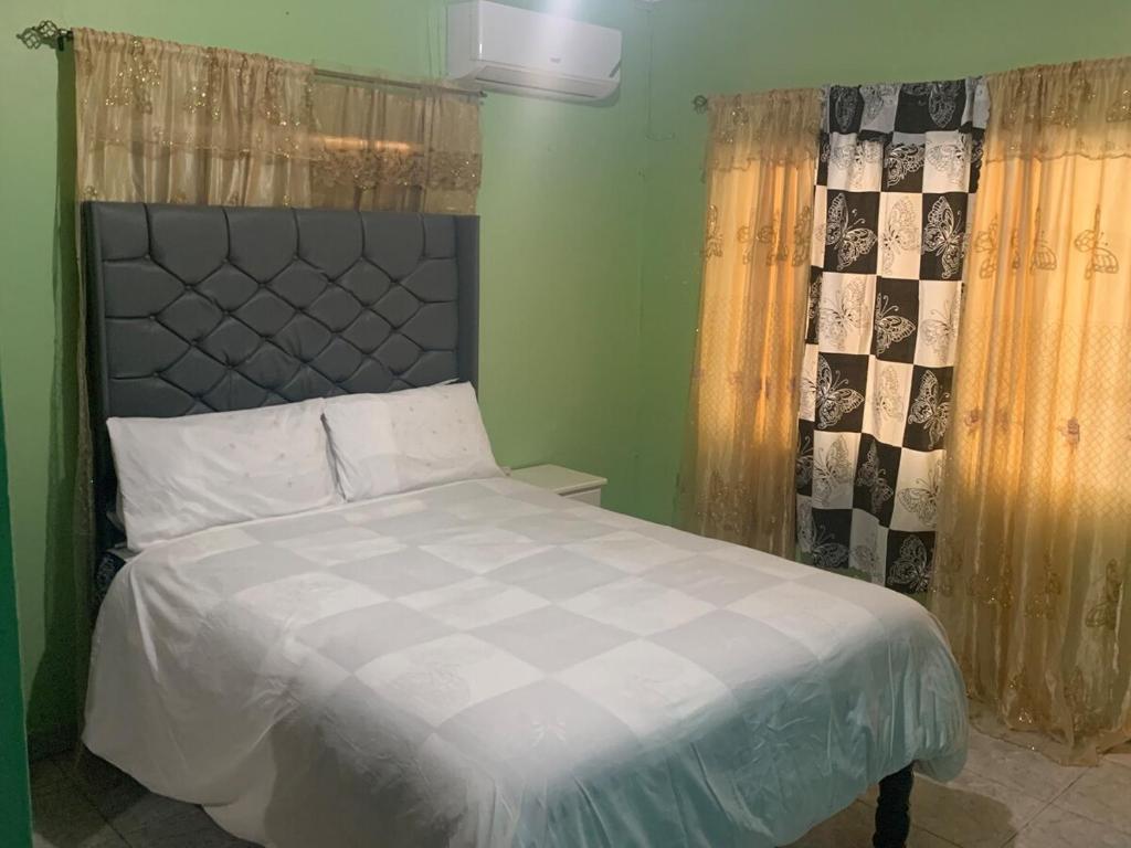 Postel nebo postele na pokoji v ubytování Netfa Cozy Gem