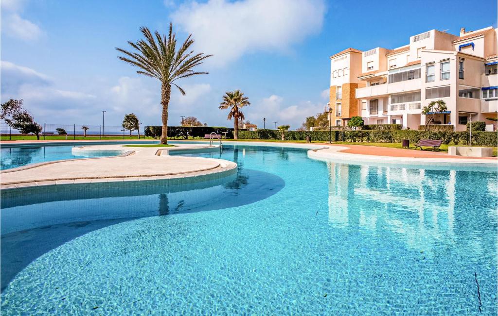 Bazén v ubytovaní Cozy Apartement In Almerimar alebo v jeho blízkosti