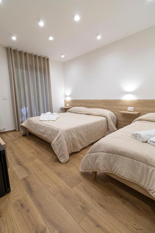 Postel nebo postele na pokoji v ubytování B&B Loricaly