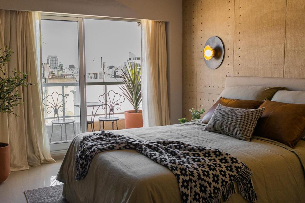 Giường trong phòng chung tại FreeDom Paseo de la Cisterna UF30